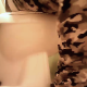 A young black woman wearing camo pants records herself shitting while sitting on a toilet. Face and action is not shown. Plop sounds are audible but not loud. About 12 minutes.